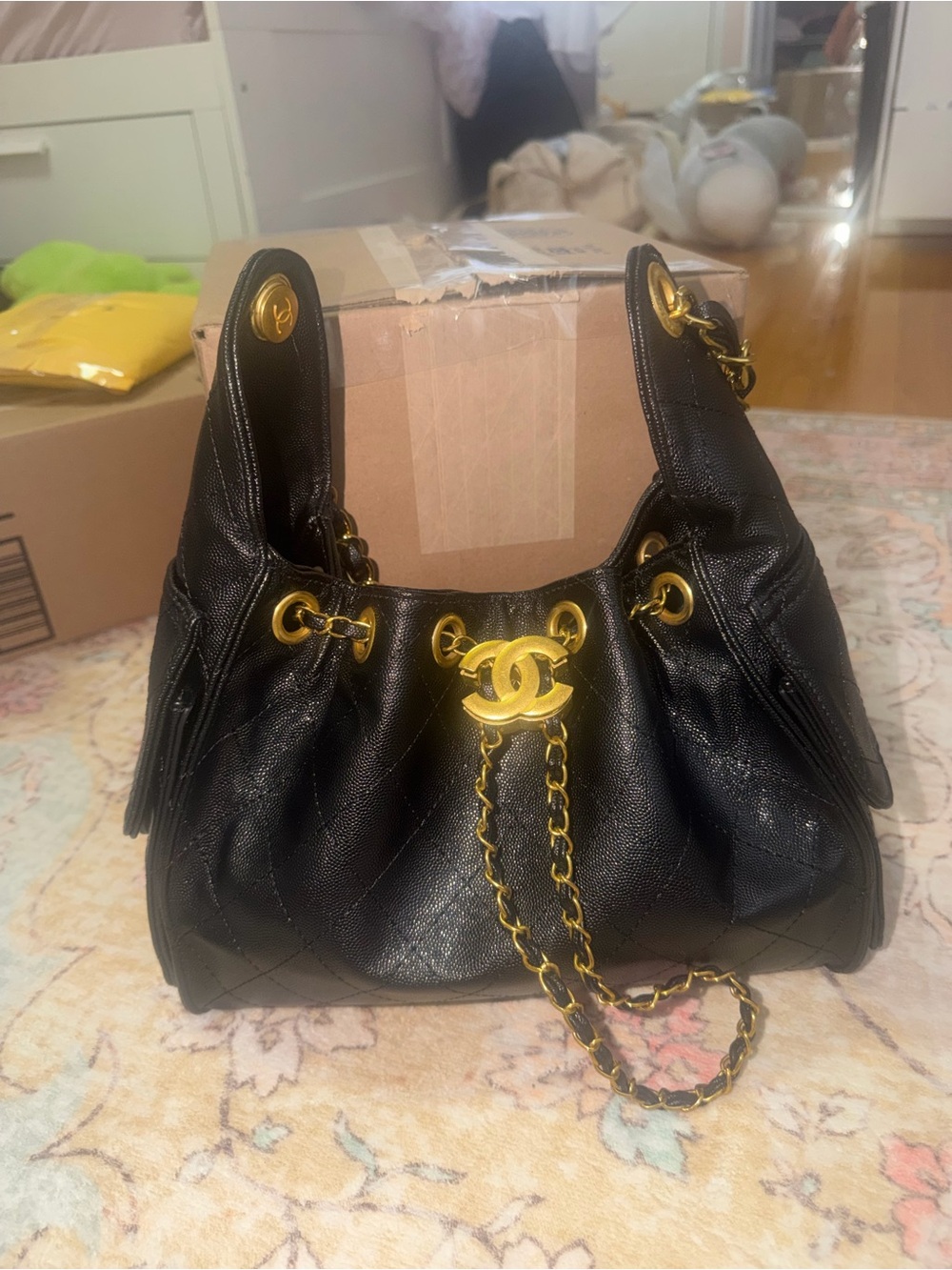 CHANEL Black Quilted Leather Shoulder Bag with Gold Chain & CC Logo